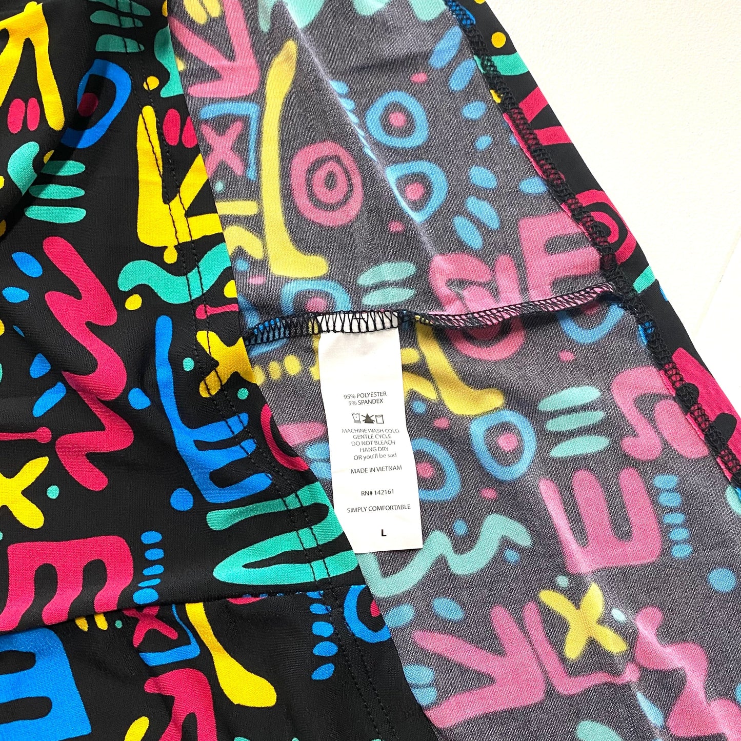 LuLaRoe Womens L Irma Multicolor/Black Graffiti Pattern S/s Tunic Top NWT