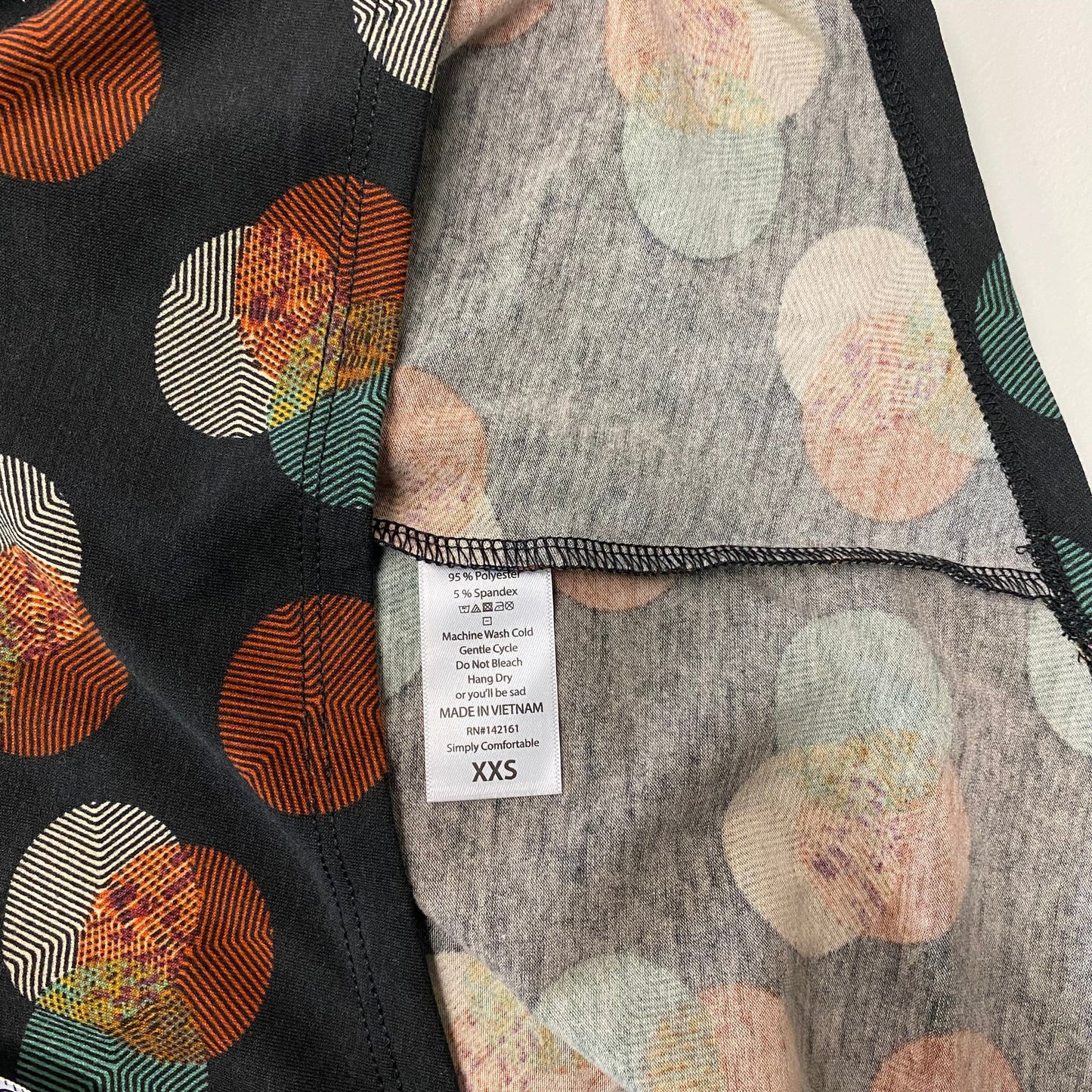 LuLaRoe Womens Size XXS Multicolor/Black Circles IRMA S/s Top NWT
