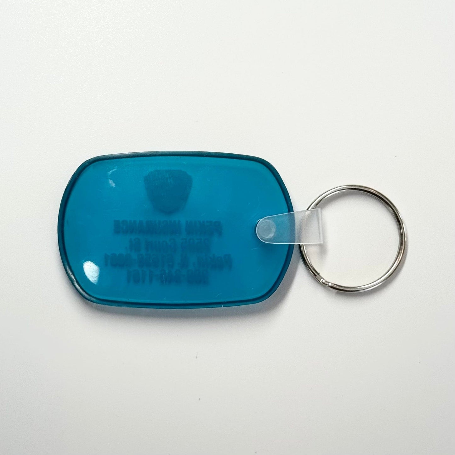 Vintage ‘Pekin Insurance - Pekin, IL’ Keychain Key Ring Blue Rubber Oval