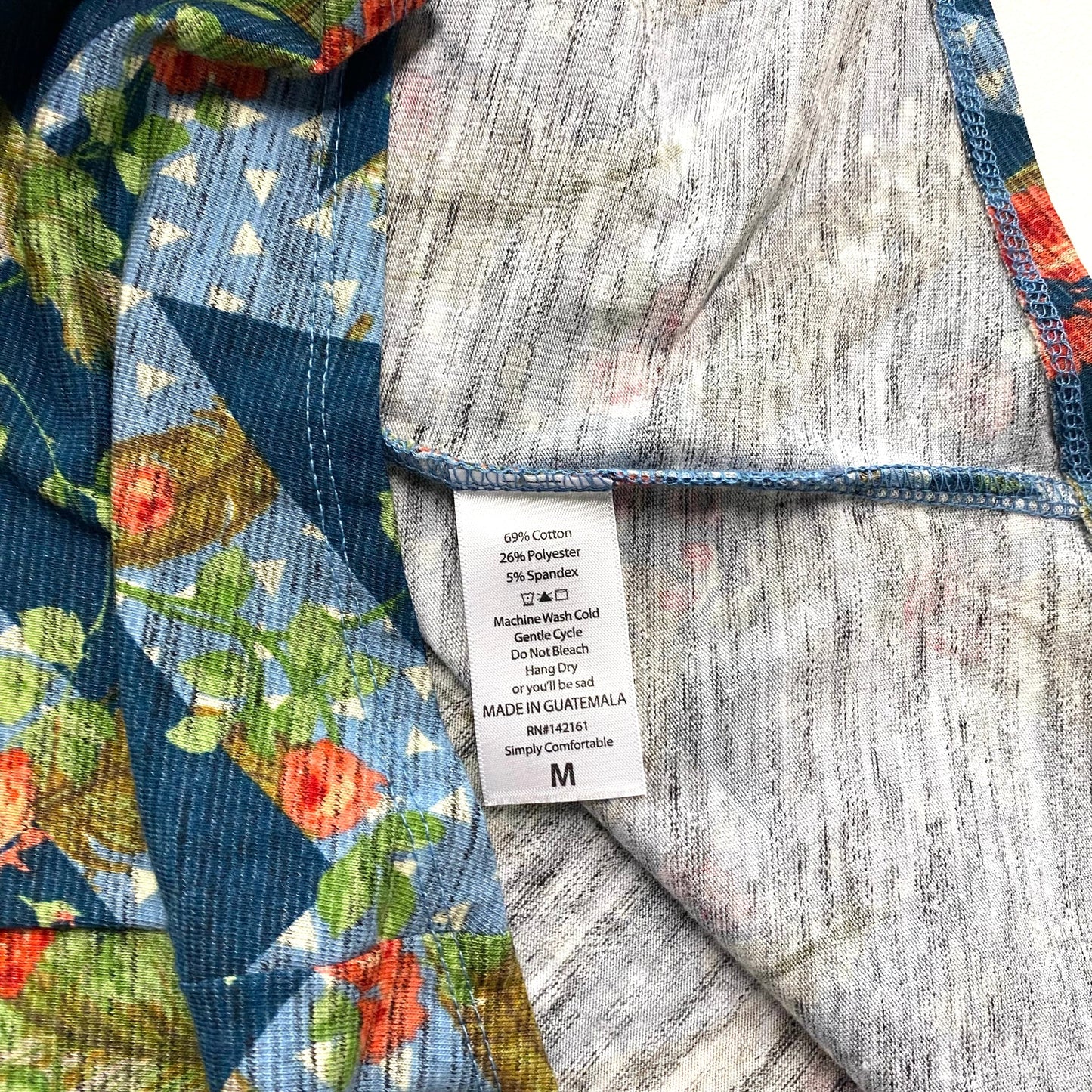 LuLaRoe Womens M Irma Blue Floral/Triangles Pattern S/s Tunic Top NWT