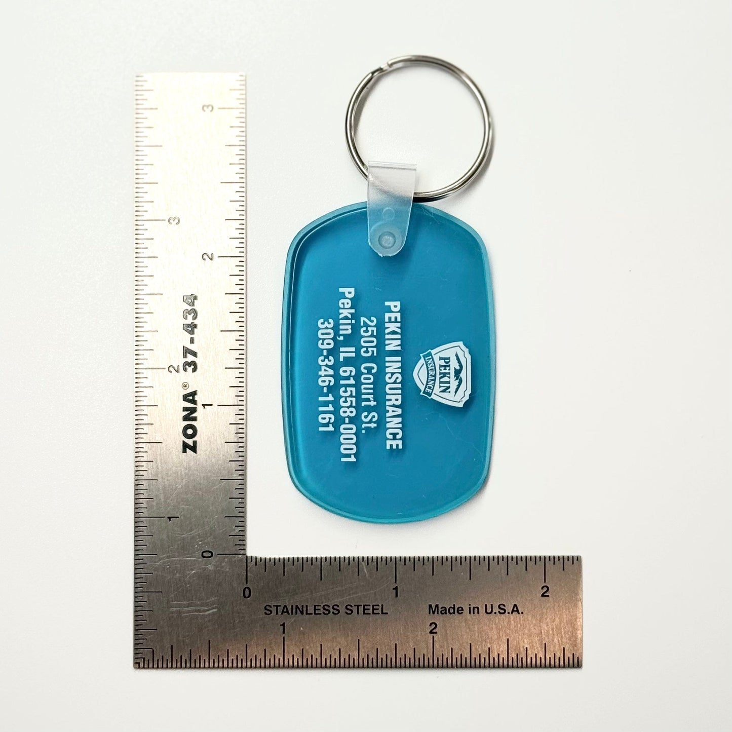 Vintage ‘Pekin Insurance - Pekin, IL’ Keychain Key Ring Blue Rubber Oval