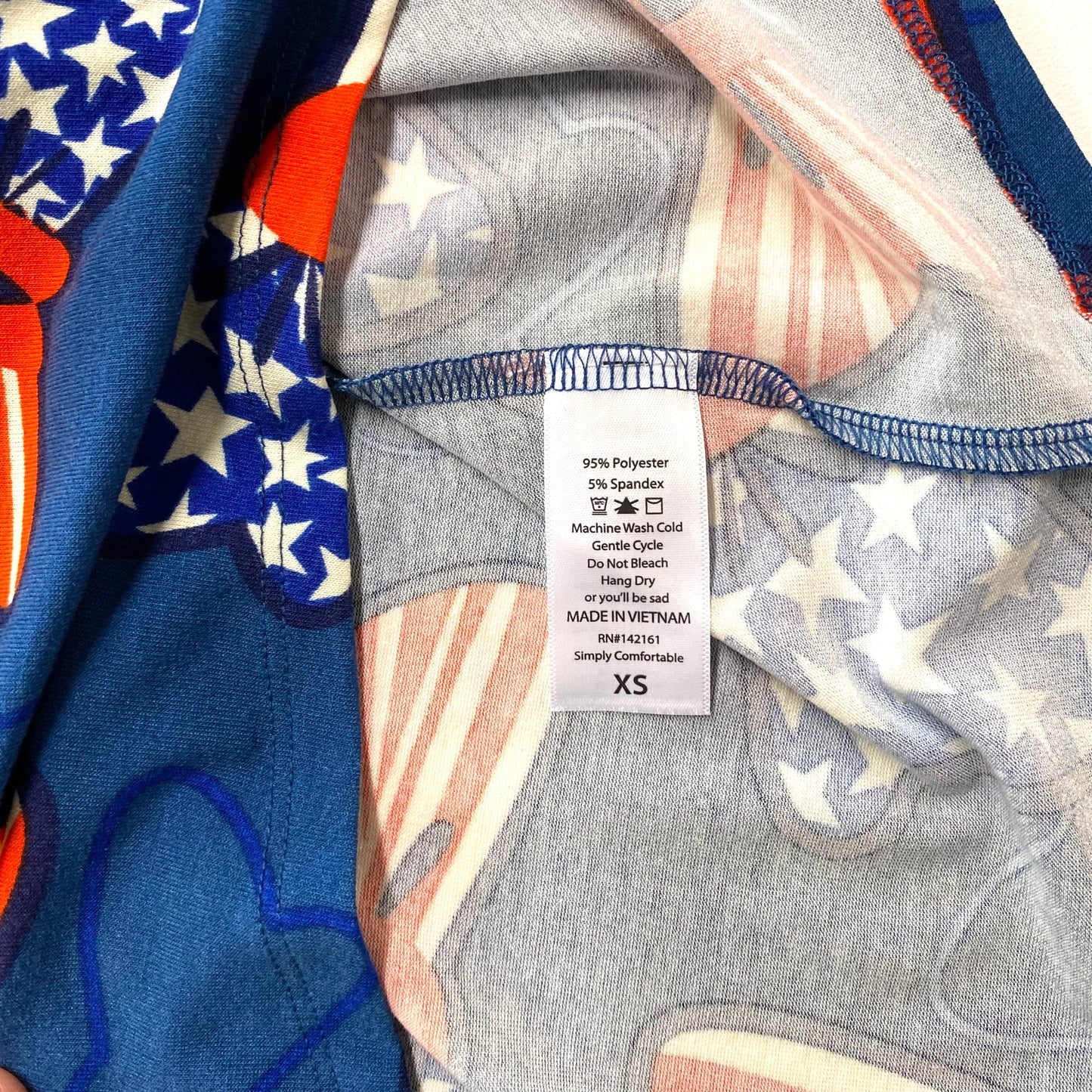 LuLaRoe Womens XS Irma Red/White/Blue American Flag Bows S/s Tunic Top NWT