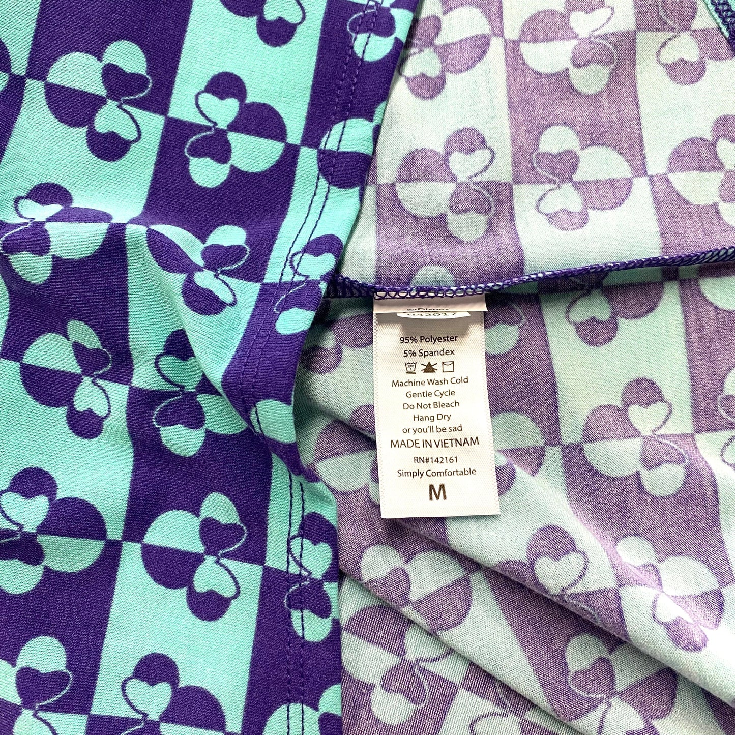 LuLaRoe Disney | ‘Minnie Mouse’ Counterchange Pattern Irma S/s Tunic Top | Color: Light Blue/Green | Size: M | NWT