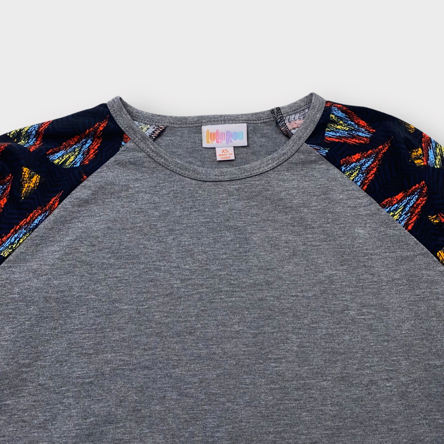 LuLaRoe Randy Tee XS (0-2) - Heather Gray with Black and Multicolor Abstract Print Sleeves - Soft Stretch Fabric