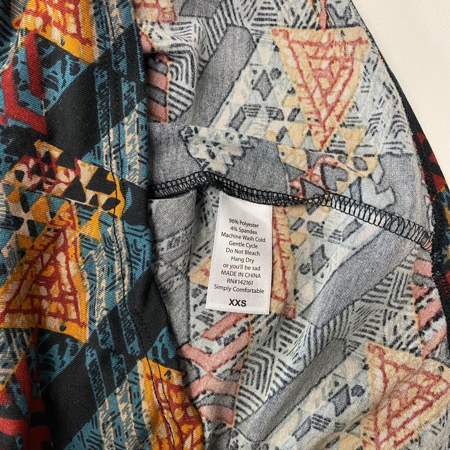 LuLaRoe Womens Size XXS Multicolor/Black Geometric IRMA S/s Top NWT
