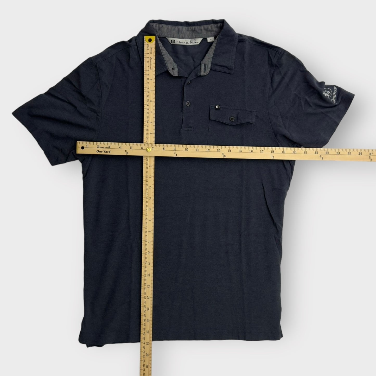 TravisMathew Men's Short Sleeve Polo Golf Shirt - Medium - Blue 'Glenmoor' Logo - Excellent Used Condition