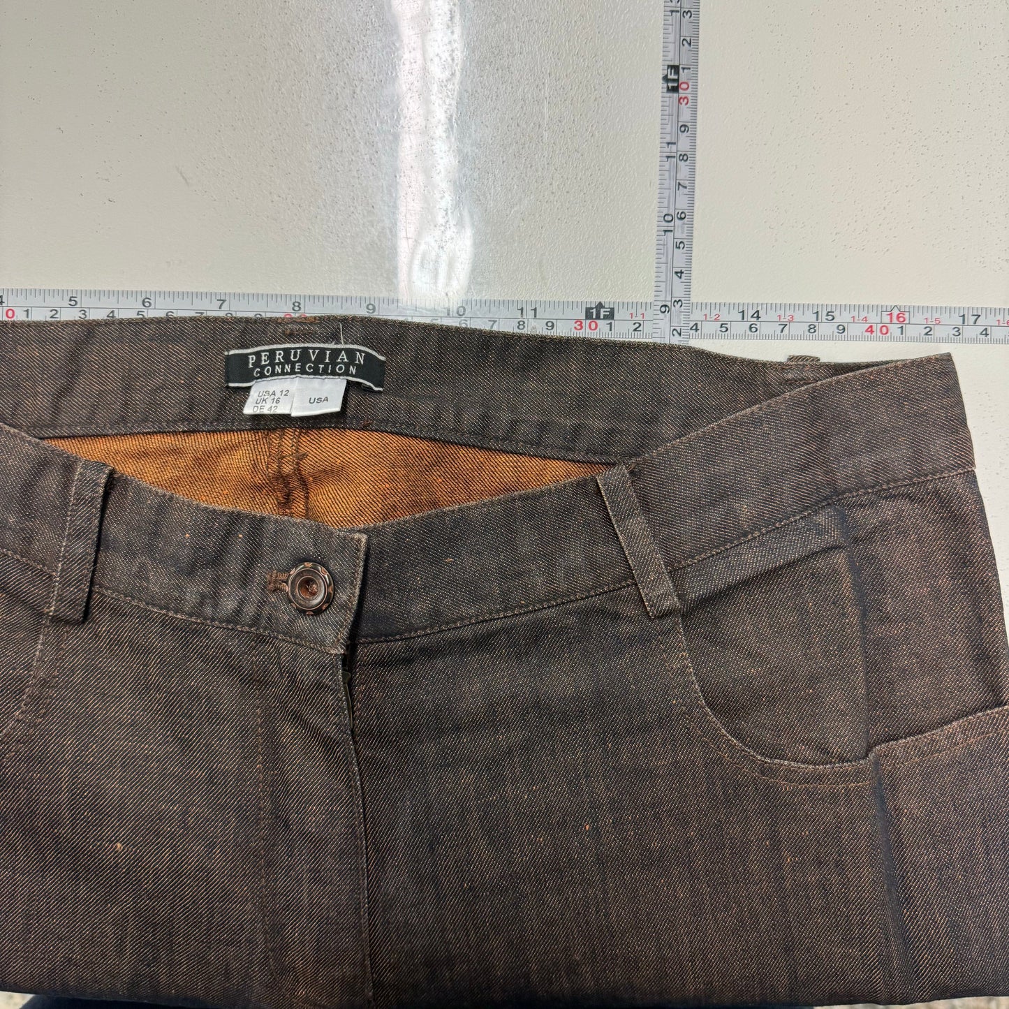 Peruvian Connection Women's Linen Denim Over Dye Jeans - Pre-Owned Size 12 for Casual Wear - Color: Brown