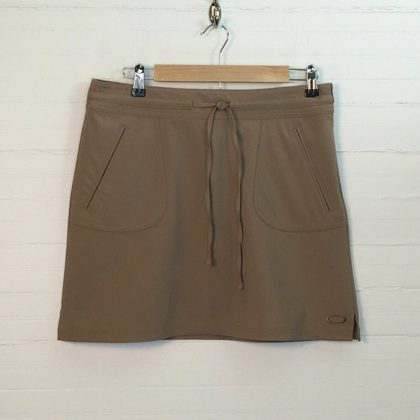 Sophisticated Oakley Womens Tennis Skirt - Beige - Size 10 - Drawstring Embroidered Logo