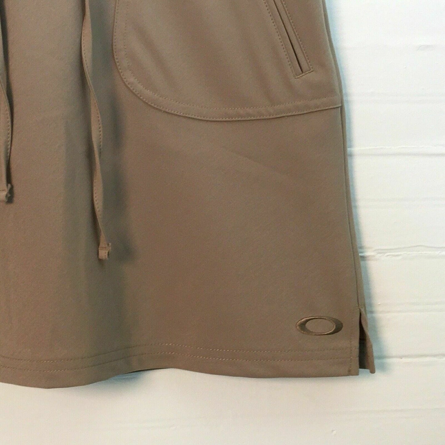 Sophisticated Oakley Womens Tennis Skirt - Beige - Size 10 - Drawstring Embroidered Logo