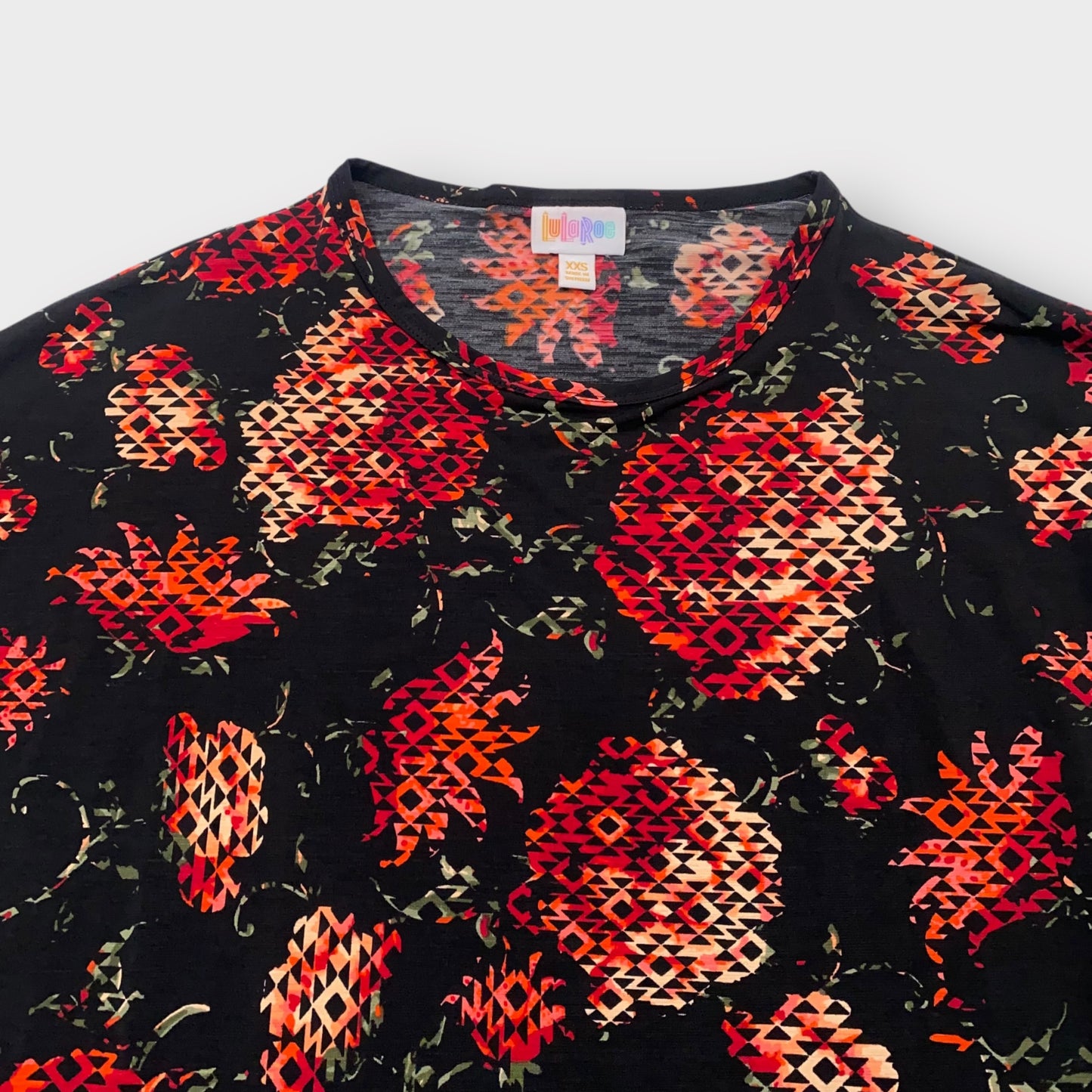 LuLaRoe Irma Tunic Top - Black with Red & Orange Geometric Floral Print - XXS (00) - Soft Stretch Polyester Spandex - High-Low Hem