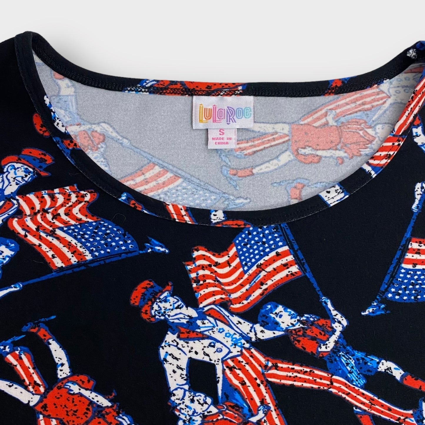 LuLaRoe S/s Irma Tunic | S (6-8) | Black/Multicolor Uncle Sam | NWT