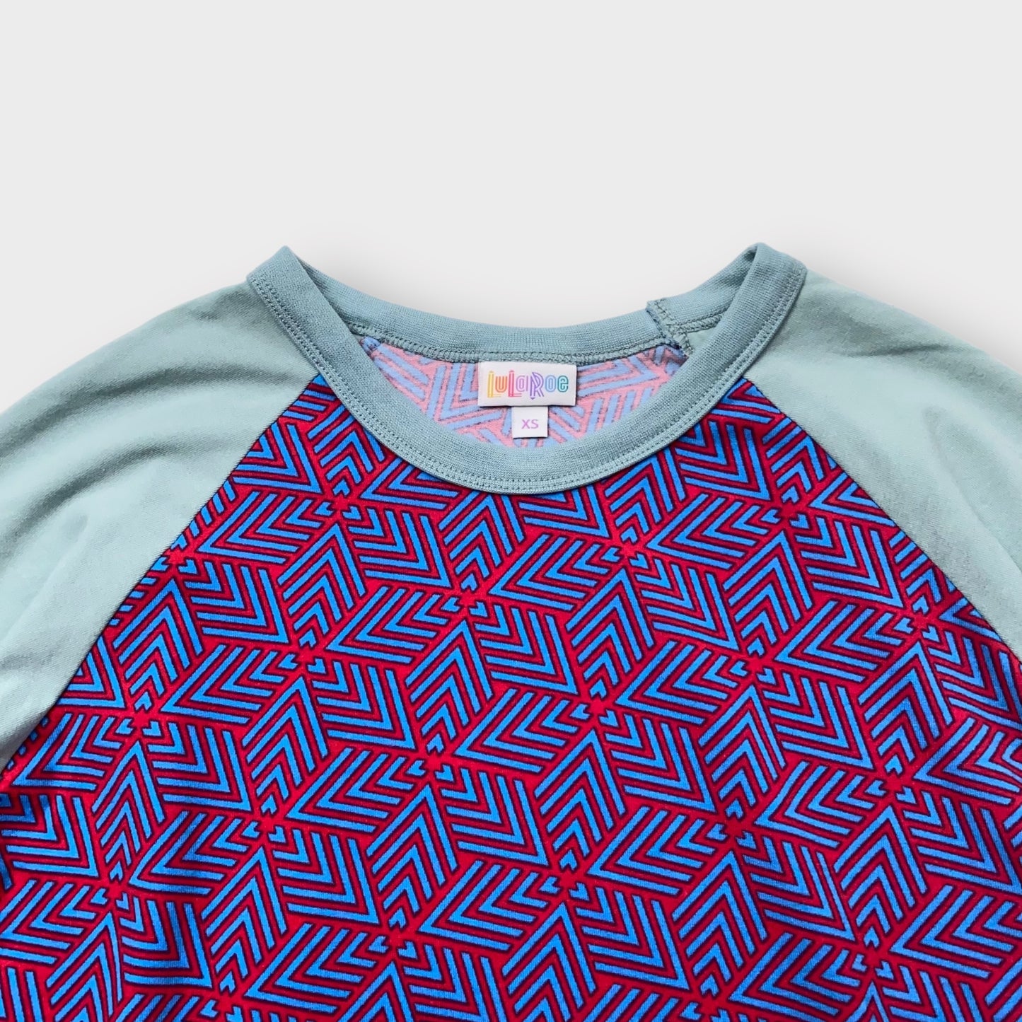 LuLaRoe Randy Tee XS (0-2) - Burgundy & Blue Geometric Print with Sage Green Raglan Sleeves - Soft Stretch Polyester Spandex