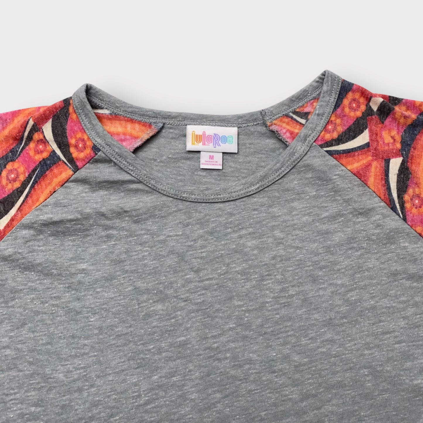 LuLaRoe Randy Baseball Tee M (8-10) - Heather Gray with Red/Orange/Black Geometric Abstract Sleeves - Soft Cotton Polyester Rayon Blend