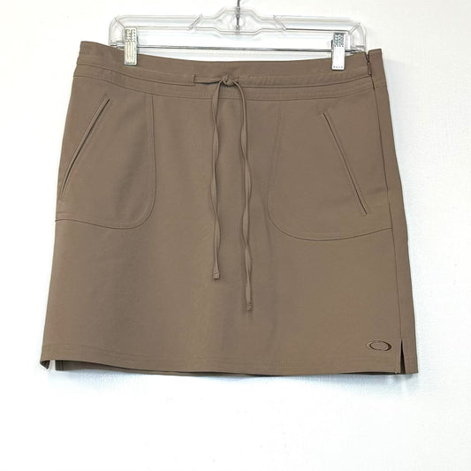 Oakley | Womens Tennis Skirt | Color: Beige | Size: 10 | Pre-Owned