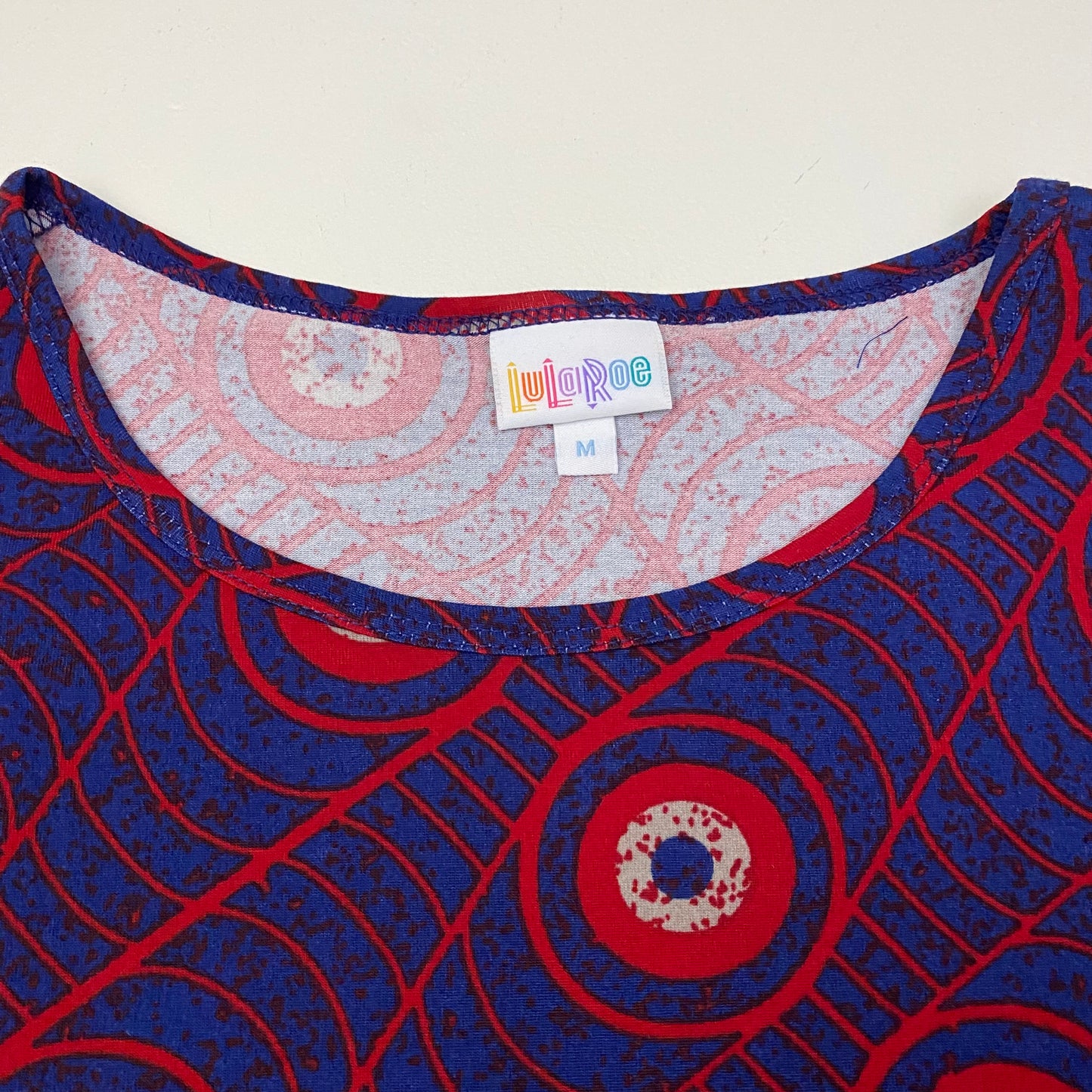 LuLaRoe S/s Irma Tunic | M (10-12) | Blue/Red Geometric/Peacock | NWT