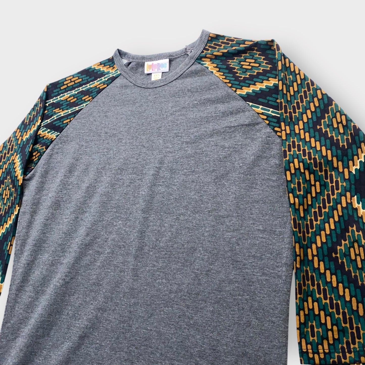 LuLaRoe Randy Raglan Tee XXS (00) - Charcoal Gray with Green/Gold/Black Aztec Geometric Sleeves - Soft Stretch Fabric