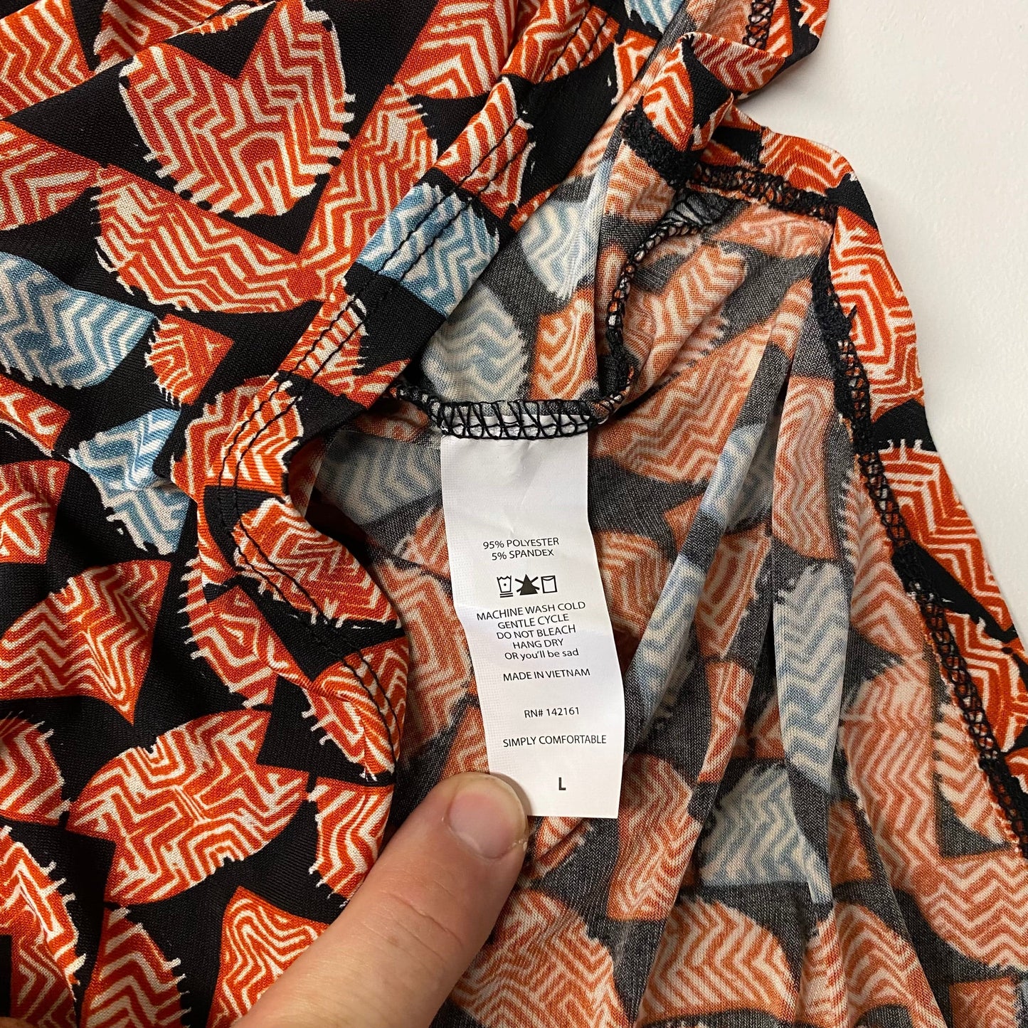 LuLaRoe Womens Size L Orange/Blue/Black Geometric/Circles IRMA S/s Top NWT