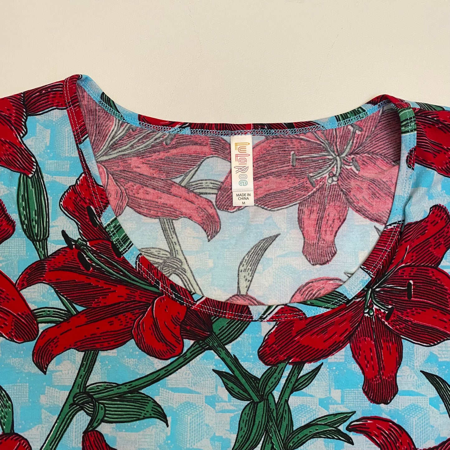 LuLaRoe Perfect T Swing Top | M (10-12) | Light Blue/Red Floral | NWT