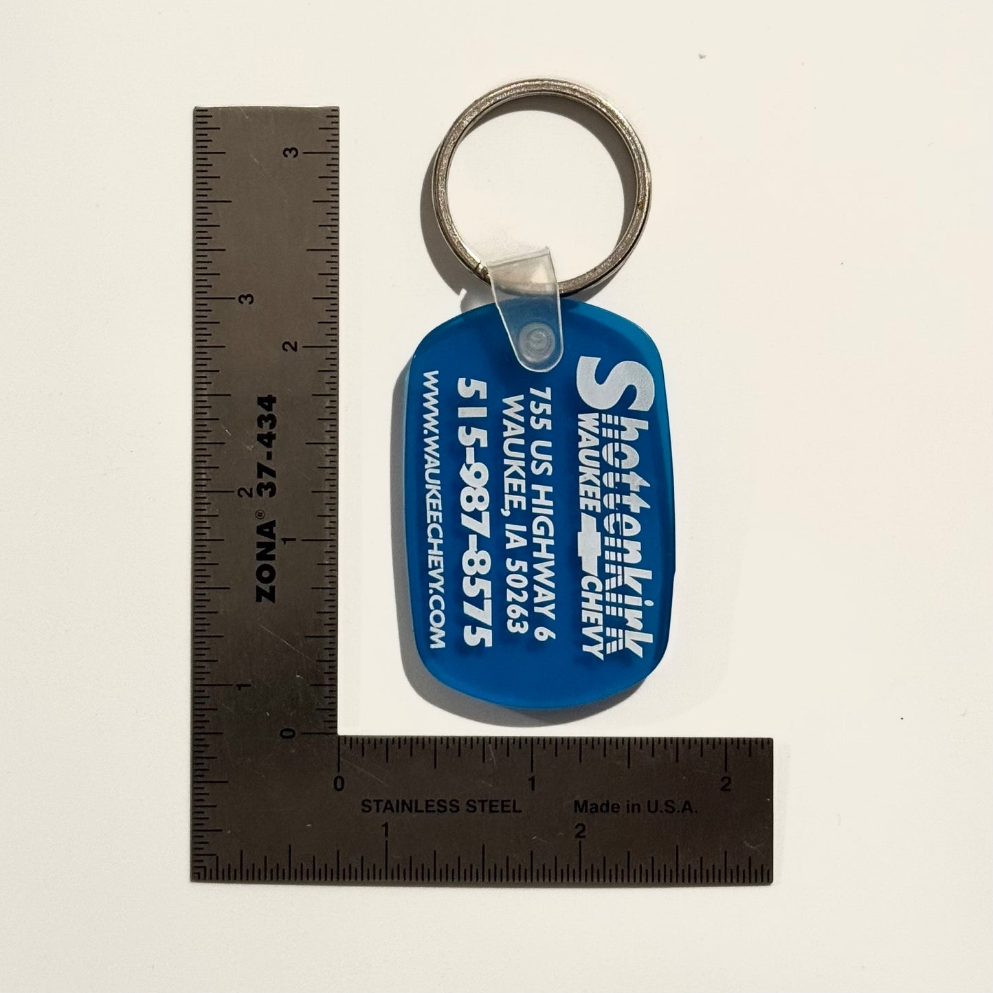 ‘Shottenkirk Waukee (IA) Chevy’ Keychain Key Ring Blue Rubber Oval