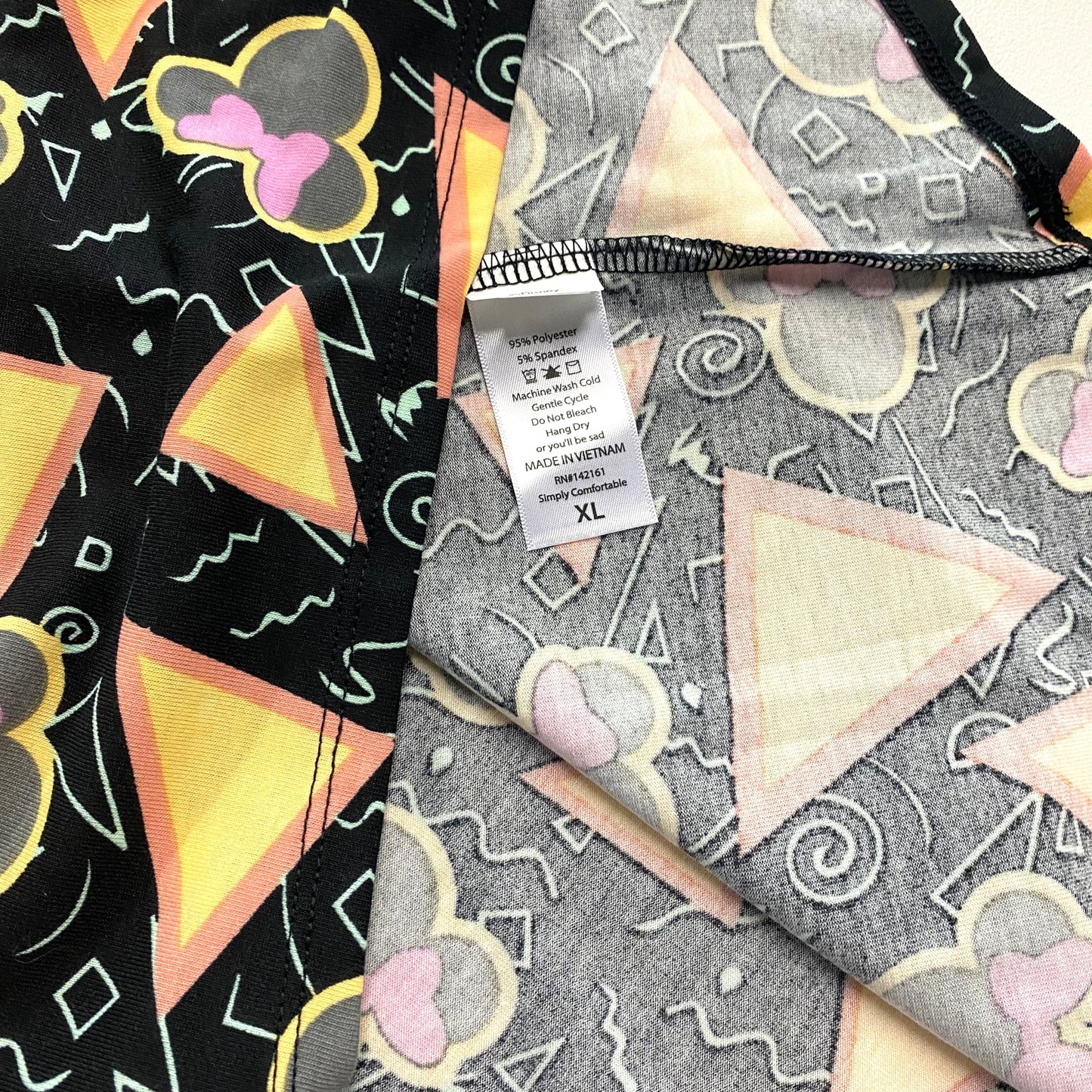 LuLaRoe Womens XL Irma Black/Pink/Yellow ‘Minnie Mouse’ Retro/Triangles Pattern S/s Tunic Top NWT