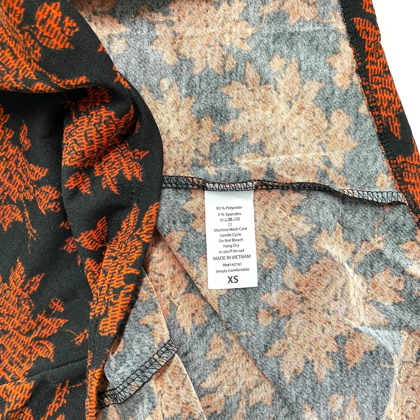 LuLaRoe Womens XS Irma Orange/Black Botanical Pattern S/s Tunic Top NWT