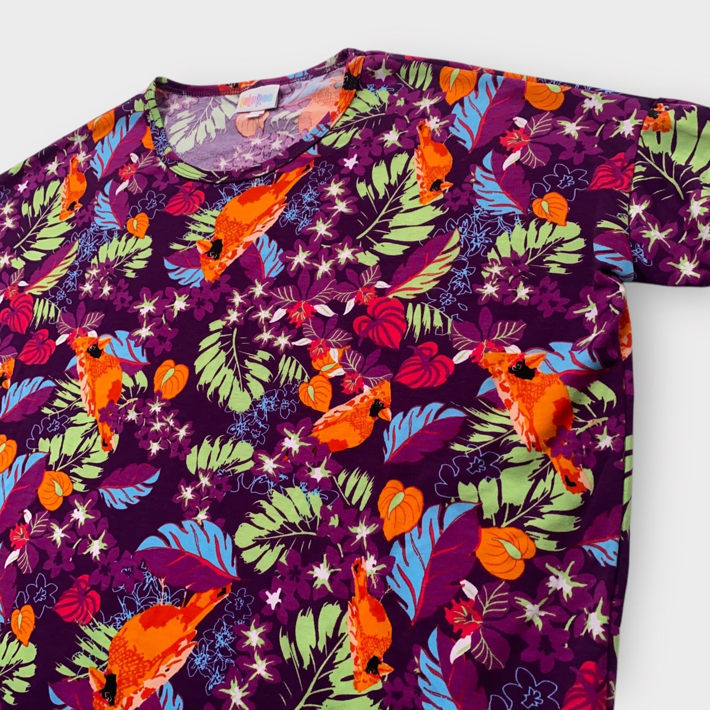 LuLaRoe Irma Tunic Top - Purple with Tropical Leaves & Orange Cardinal Bird Print - XXS (00) - Soft Stretch Polyester Spandex - High-Low Hem