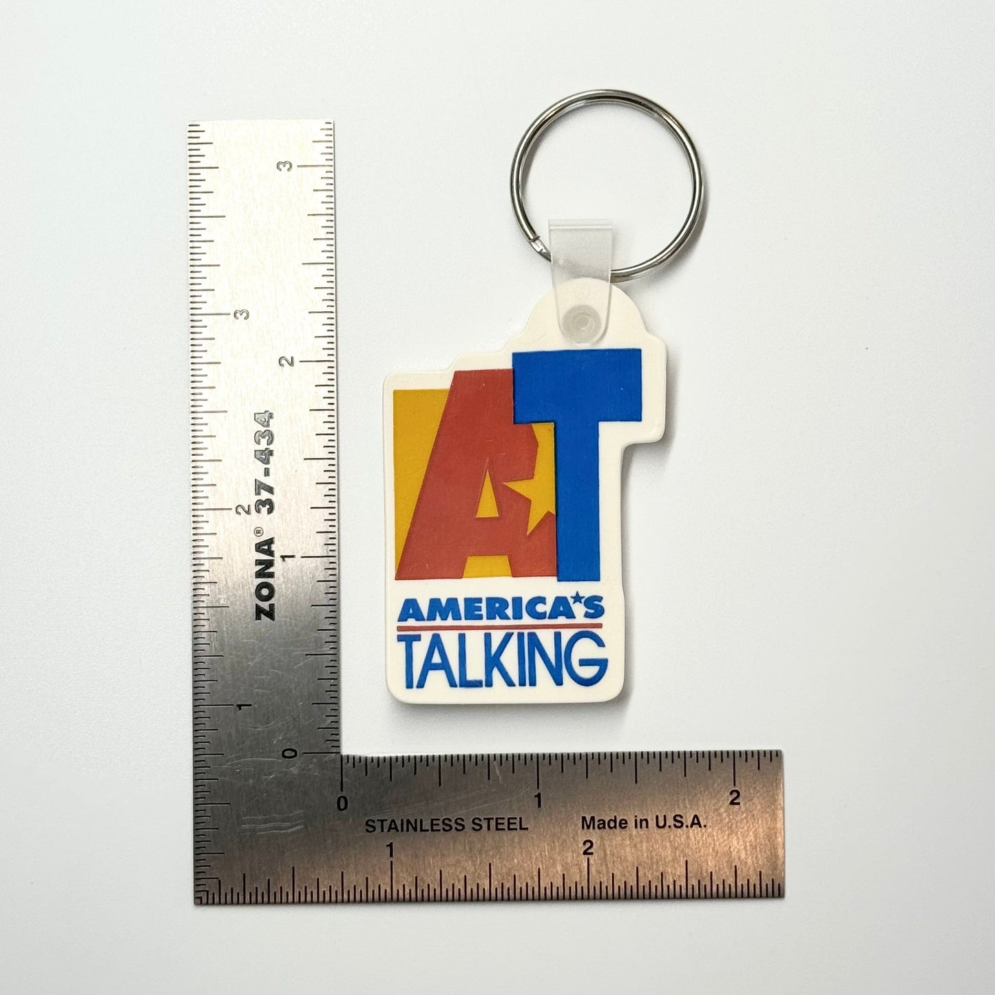 Vintage ‘America’s Talking Network’ Keychain Key Ring Rubber White, Pre-Owned
