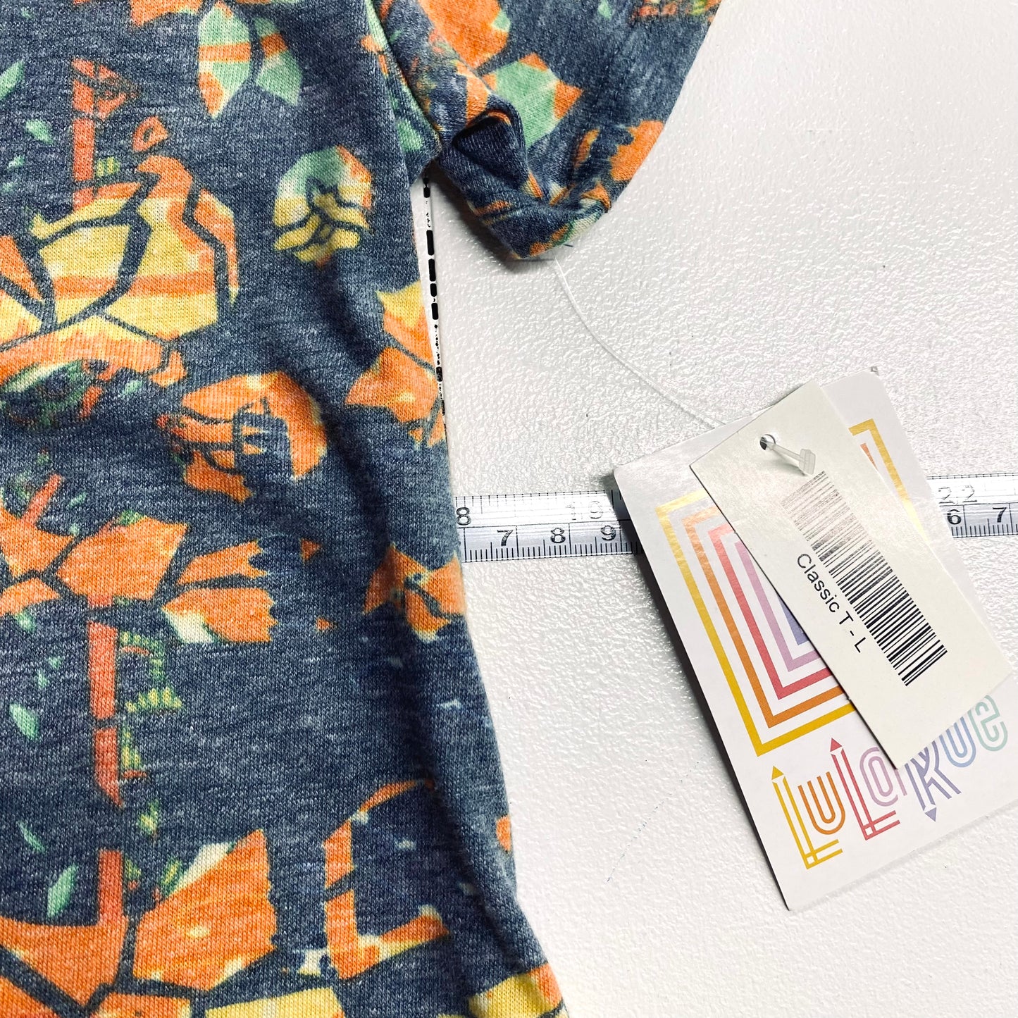 LuLaRoe Womens L Heather Blue/Orange Geometric-Floral Classic T S/s Top Pre-Owned