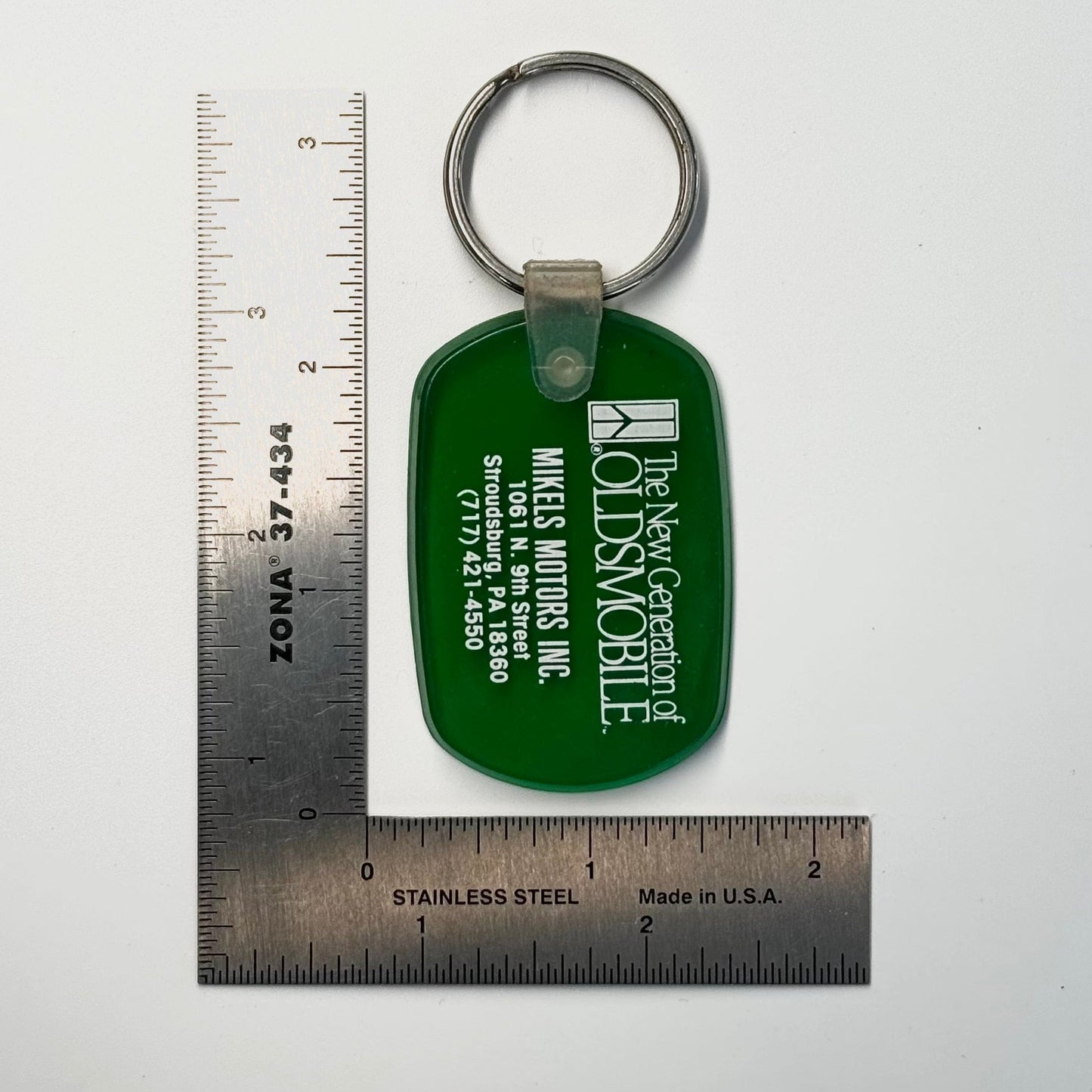 Vintage ‘Mikels Motors Oldsmobile -Stroudsburg, PA’ Keychain Key Ring Green Rubber Ov