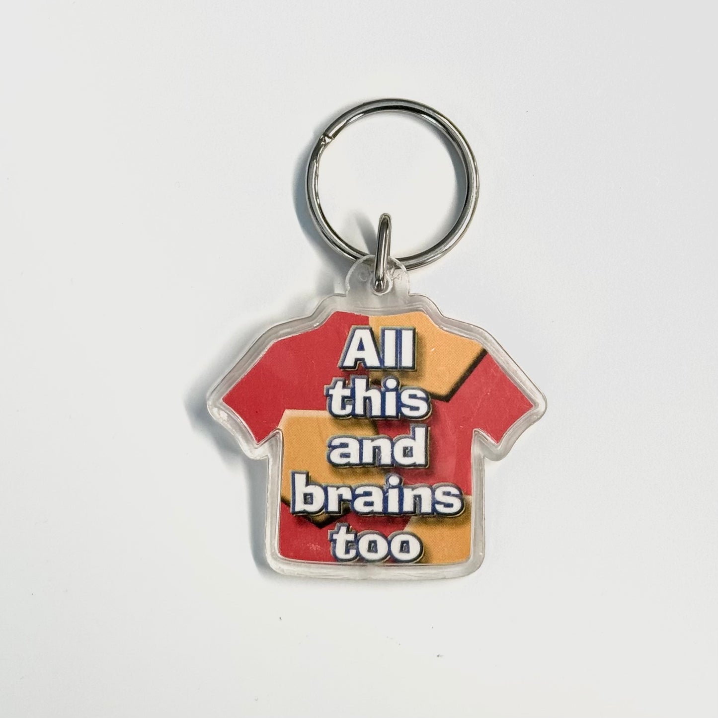 Novelty T-Shirt Acrylic Keychain ‘All this and brains too’ Key Ring, Pre-Owned