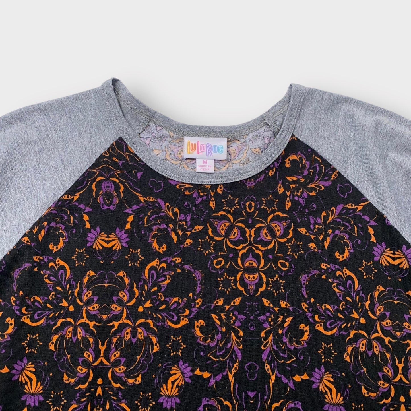 LuLaRoe Randy Raglan Top M (8-10) - Black with Orange and Purple Ornate Print - Heather Gray 3/4 Sleeves - Soft Stretch Polyester Spandex