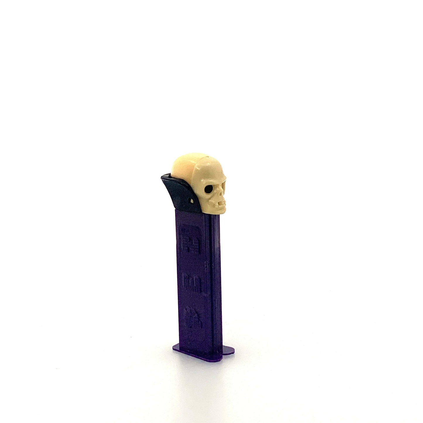 Pez Dispenser | Skull - Yugoslavia | Color: Purple | Pre-Owned